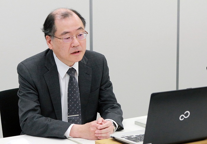 腰山事務総長による説明の写真