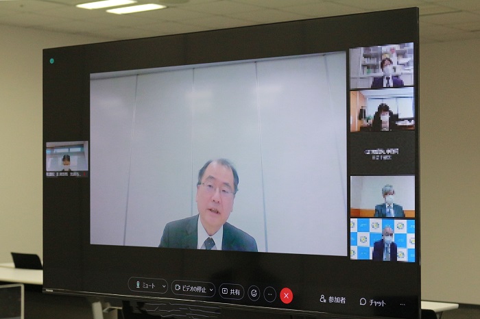 腰山事務総長による説明の写真