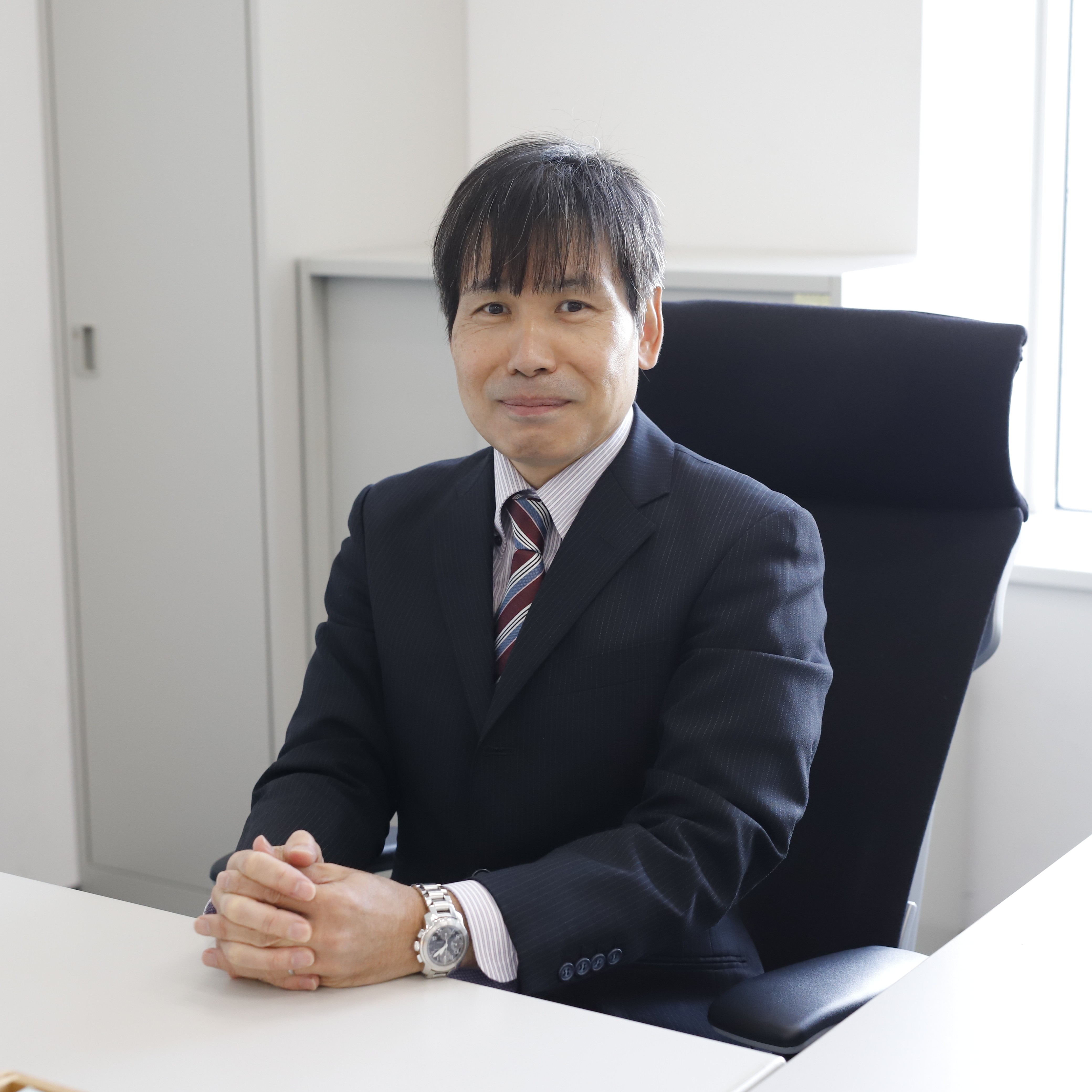 2026年採用パンフレットP12の職員の写真